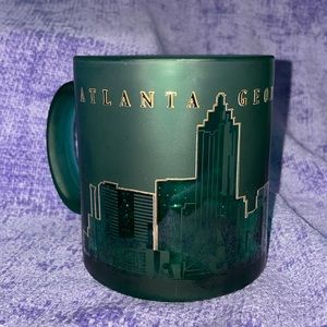 Atlanta Georgia city skyline in gold gilding green glass souvenir coffee cup mug